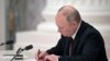 UKRAINE-CRISIS/RECOGNITION-PUTIN-ADDRESS-DECREE