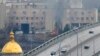 Ukraine -- Smoke and flame rise near a military building after an apparent Russian strike in Kyiv, Ukraine, Thursday, Feb. 24, 2022. 