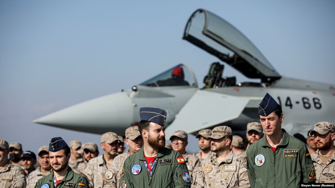Spanish pilots and soldiers stand in front of a Spanish Air Force Eurofighter Typhoon jet at Bulgaria's Graf Ignatievo airbase in Bulgaria earlier this year. 