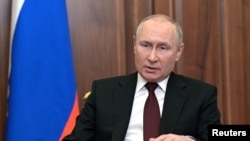 Руският президент Владимир Путин по време на телевизионното си обръщение в понеделник.