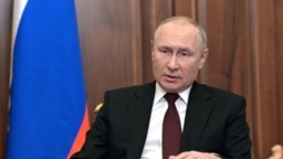 Руският президент Владимир Путин по време на телевизионното си обръщение в понеделник.