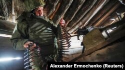 Боевик гибридных сил России на позициях в Луганской области