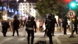 Serbia's police intervene to end standoff between ruling party supporters and anti-government protesters in Belgrade