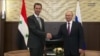 Putin l-a primit pe Assad la Soci 