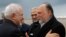 Iran's Foreign Minister Mohammad Javad Zarif, left, greets by Lebanese Hezbollah lawmaker, Ali Ammar, upon his arrival at Rafik Hariri Airport, in Beirut, Lebanon, Sunday, Feb. 10, 2019. Zarif said his country is ready to cooperate with the new Lebanese g