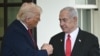 (FILES) US President Donald Trump shakes hands with Israeli Prime Minister Benjamin Netanyahu as Netanyahu departs the White House in Washington, DC, on April 7, 2025.