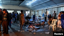 Ljudi primaju medicinsku pomoć u privremenoj bolnici, La Gvaira, 25. jun 2026.