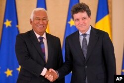 Președintele Consiliului European, António Costa, și președintele român Nicușor Dan.