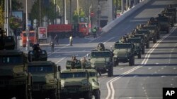 Russia - Military vehicles move toward Red Square to attend a Victory Day military parade in Moscow, May 9, 2023.