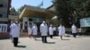 COVID-19: Kazakhstan Holds National Day Of Mourning, Third Iranian Deputy Dies Of Virus