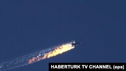 Сбитый самолетом турецких ВВС российский бомбардировщик СУ-24. 