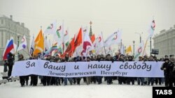 Opposition demonstrators stage a march "For your and our freedom" in central St. Petersburg on December 9.