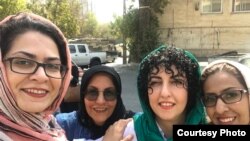 FILE - Narges Mohammadi (C), Iranian human rights activist.