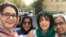 Narges Mohammadi (2nd from R), Iranian human rights activist, on a brief leave from prison greeted by other female activists. Sep 2018. FILE PHOTO