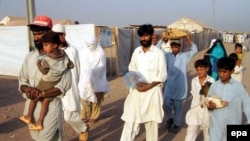 Pakistani refugees prepare to go back to the Swat region.