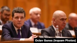 Nicușor Dan și Ilie Bolojan, în Parlament, la ședința în care a fost prezentată Strategia Națională de Apărare a Țării 2025-2030.