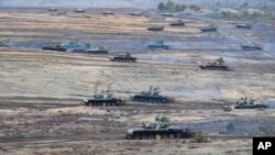 Tanks take part in Russia-Belarus military drills at the Obuz-Lesnovsky training ground in Belarus on February 19, five days before Russia's invasion of Ukraine. 