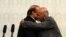 Pakistani Prime Minister Nawaz Sharif (left) and Afghan President Ashraf Ghani hug during Sharif's visit to Kabul on May 12.