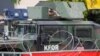 A U.S. member of the NATO-led Kosovo Force (KFOR) stands guard near a municipal building in Leposavic, northern Kosovo, on May 31. 