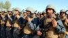 FILE: An Afghan police graduation ceremony in Helmand, November 2018.