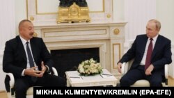 RUSSIA -- Russian President Vladimir Putin (Right) and Azerbaijani President Ilham Aliyev (Left) during their meeting at the Kremlin in Moscow, Russia, 20 July 2021.