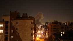 Smoke rises in Tehran following after strikes by the United States and Israel, which vowed to intensify attacks.
