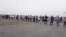 Residents for a human chain in Iran's Qeshm island to protest decision handing over tourism services to private sector. October 21, 2019