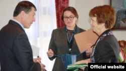 U.S. Ambassador Susan Elliot (right) meets with Tajik Interior Minister Ramazon Rahimov on April 14.