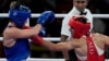 Algerian boxer Imane Khelif lands a left on Hungary's Luca Anna Hamori during their women's 66-kilogram quarterfinal women's boxing match at the Paris Olympics on August 3. 