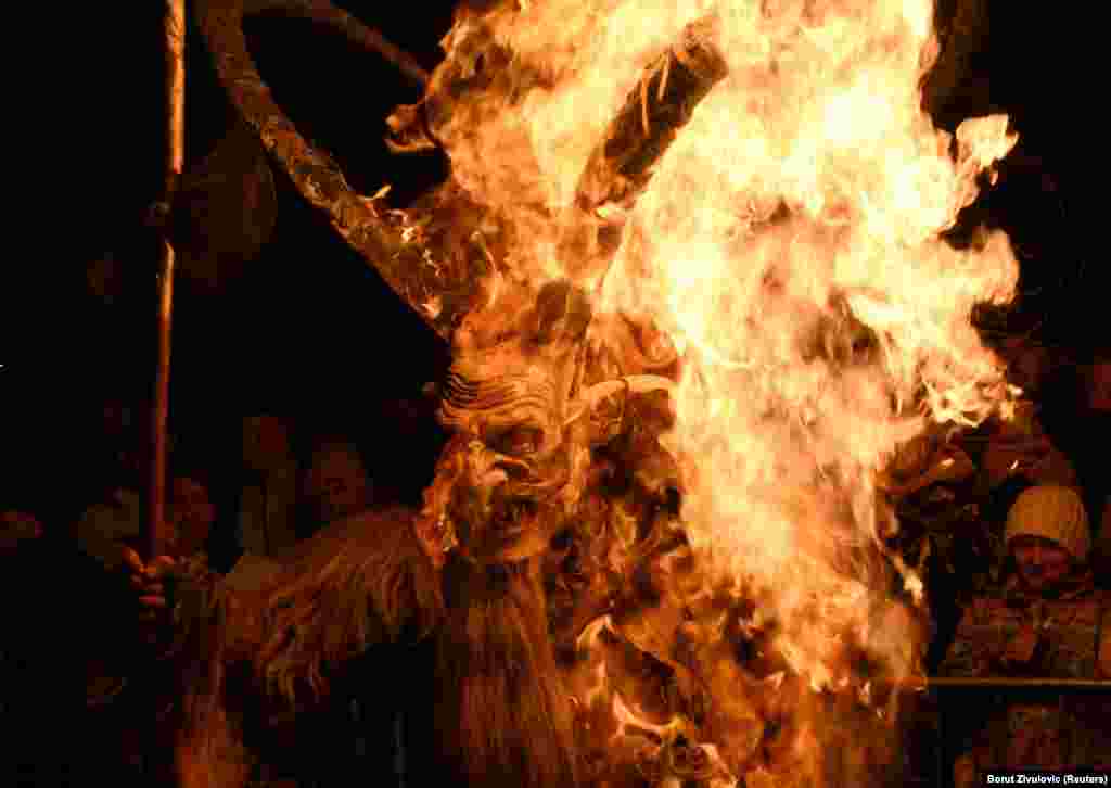 A man dressed as a devil performs during a Krampus show in Goricane, Slovenia. (Reuters/Borut Zivulovic)