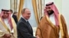 Președintele Vladimir Putin și Prințul Mohammed bin Salman la o întîlnire la Kremlin în 14 iunie 2018