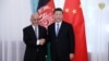 Afghan President Ashraf Ghani (right) greets his Chinese counterpart, Xi Jinping, in Kyrgyzstan, in June 2019.