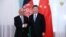 Afghan President Ashraf Ghani (right) greets his Chinese counterpart, Xi Jinping, in Kyrgyzstan, in June 2019.