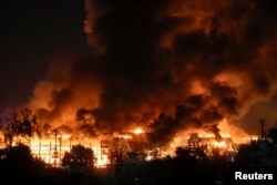 Clădirea unui depozit arde la Kiev, în urma unui atac aerian rusesc din 5 august
