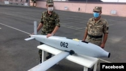 Armenia -- Armenian officers demonstrate an Israeli-made "suicide" drone SkyStriker which they say was intercepted during fighting with Azerbaijani forces, July 24, 2020.