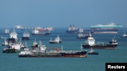 Petroliere în Strâmtoarea Singapore, la 17 martie 2026. Extremul Orient este afectat și el, ca toate regiunile industriale din lume, de conflictul SUA și Israelului cu Iranul. 