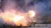 Russia -- A "TOS-1 Buratino" multiple rocket launcher fires during the "Russia Arms Expo 2013" 9th international exhibition of arms, military equipment and ammunition, in the Urals city of Nizhny Tagil, September 25, 2013