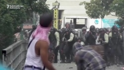 Venezuelan Police Fire Tear Gas At Antigovernment Protesters