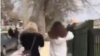 Image grab from a video showing two women in Kangavar, Kermanshah province walking in the street without headscarf. Undated