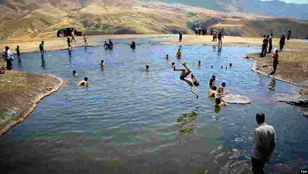 Iran -- People take a bath in the natural thermal spring “Badab-e Surt” in Mazandaran province near the Sari, Aug2012 