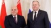 Russian Prime Minister Mikhail Mishustin (left) meets with Belarusian counterpart Syarhey Rumas in Moscow on March 11.