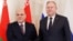 Russian Prime Minister Mikhail Mishustin (left) meets with Belarusian counterpart Syarhey Rumas in Moscow on March 11.