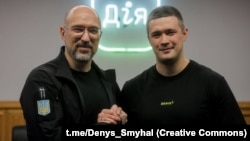 Нові члени РНБО Денис Шмигаль (л) і Михайло Федоров