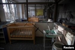 O unitate de terapie intensivă a spitalului orășenesc pentru copii din Herson a fost avariată în noaptea de Anul Nou de o lovitură militară rusă. Herson, Ucraina, 1 ianuarie 2023.