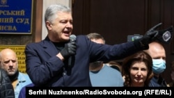 Petro Poroshenko speaks near the Pechersk district court in Kyiv on July 8.