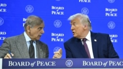 Pakistan's Prime Minister Shehbaz Sharif (L) and Kosovo's President Vjosa Osmani speak with US President Donald Trump at the "Board of Peace" meeting during the World Economic Forum (WEF) annual meeting in Davos on January 22, 2026.