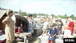 Villagers in Chek on the Kyrgyz-Uzbek border in July