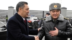 Kyrgyz President Sadyr Japarov (left) the then-head of the State Committee for National Security Kamchybek Tashiev in January, the month before the latter's dramatic dismissal. 