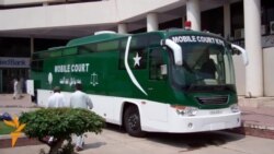 Pakistan's First Courtroom Bus Brings Mobile Justice To Peshawar