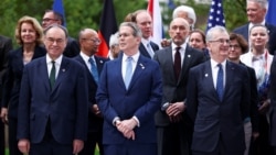 Bank of England Governor Andrew Bailey, US Treasury Secretary Scott Bessent and Banque de France Governor Francois Villeroy de Galhau pose with other attendees in Paris on May 18.